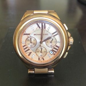 Michael Kors rose gold women’s watch